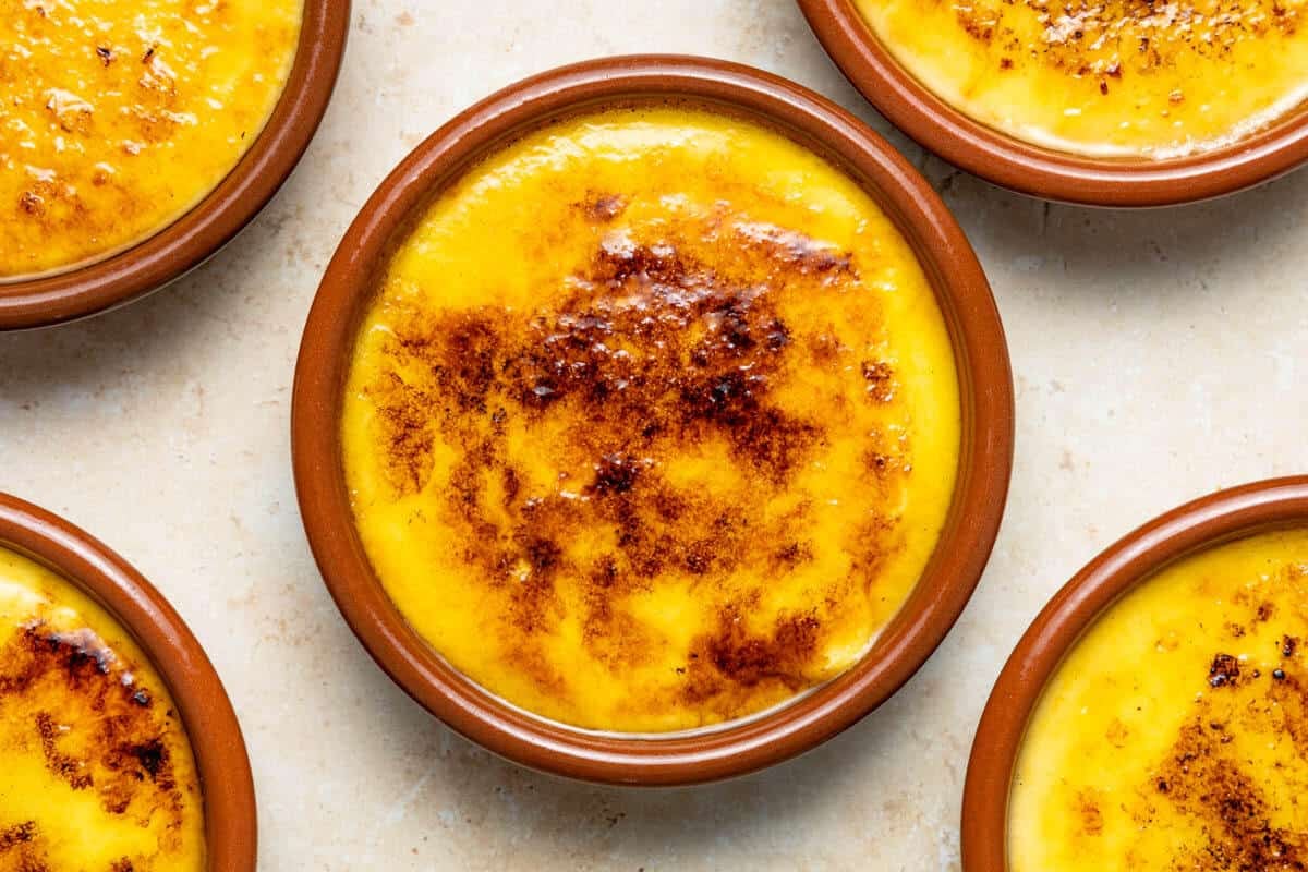 Close up shot of Crema Catalana with a golden brown caramelized sugar crust.