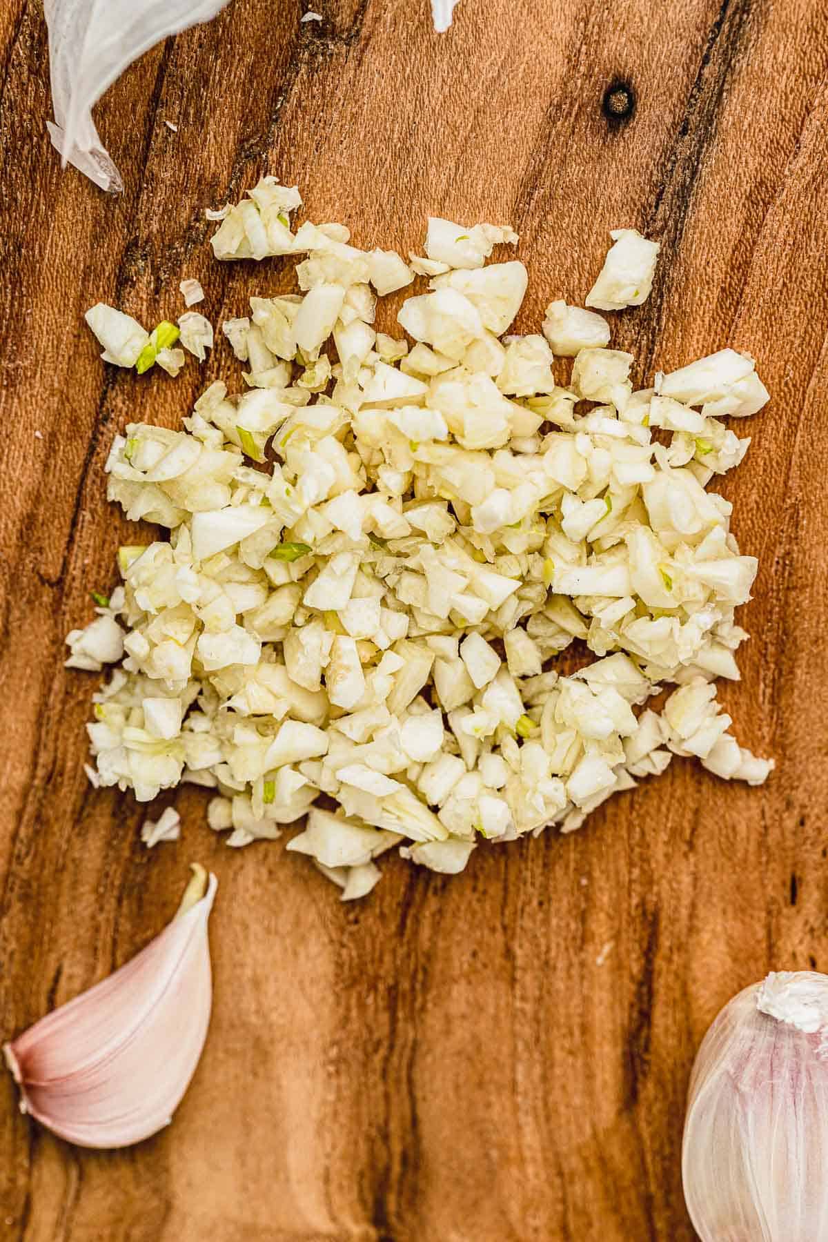 Close up of a large pile of minced garlic.