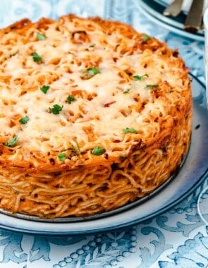 an entire spaghetti pie on a plate.