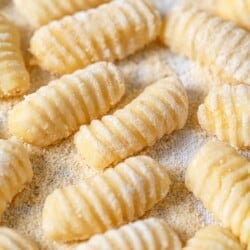 Side shot of shaped and ridged potato gnocchi.