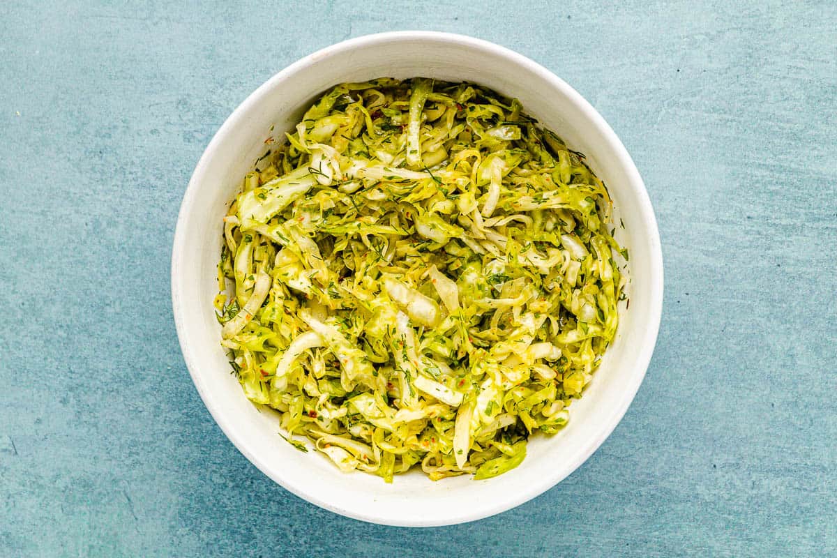 cabbage slaw in a serving bowl.