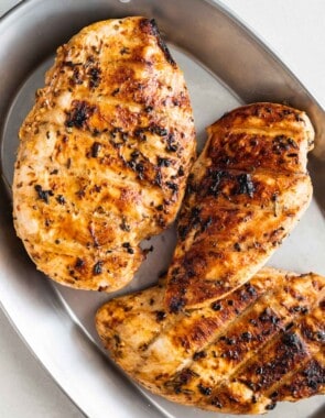 Three chicken breasts in a tray