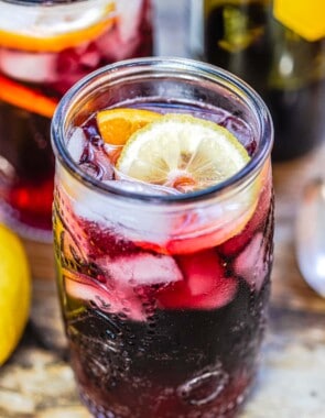 Glass of tinto de verano showing the lemon wheel garnish.