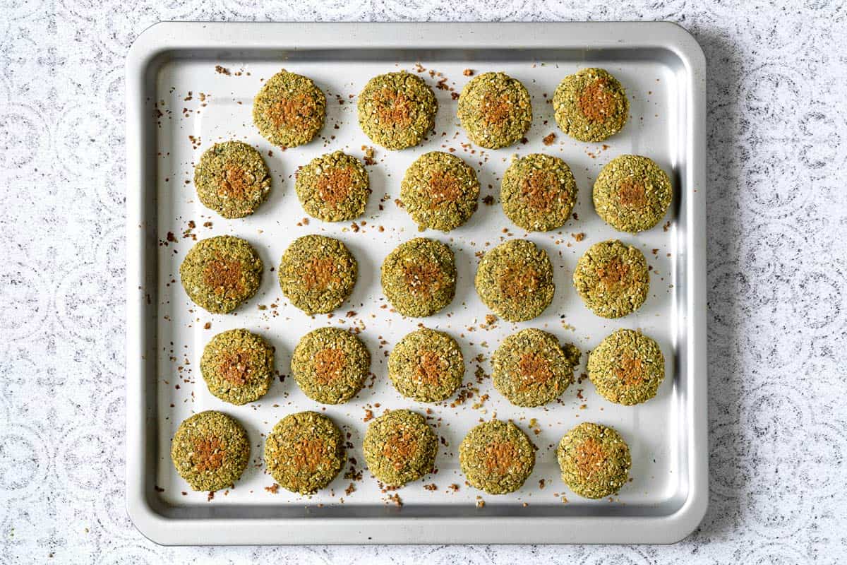 baked falafel on a sheet pan.