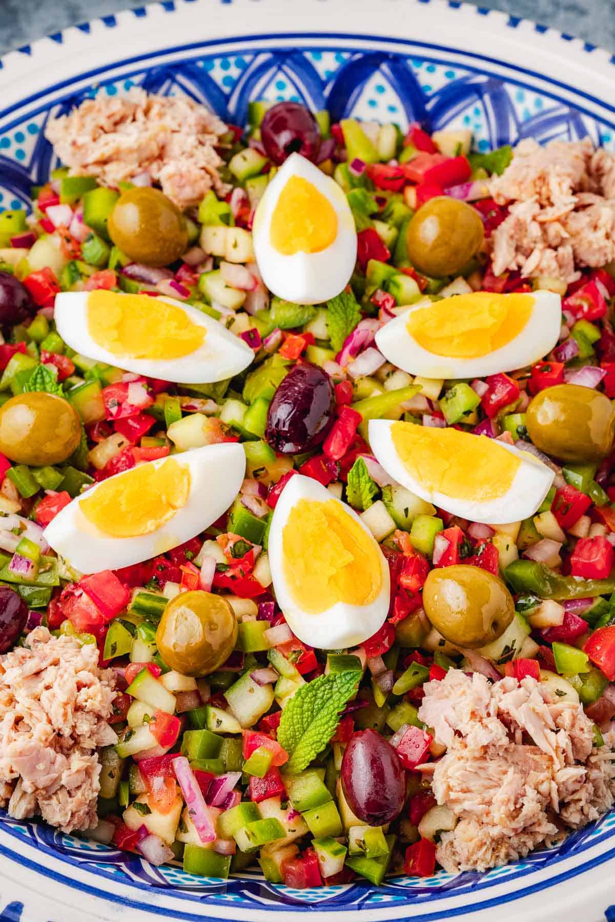 close up of Slata Tounsiya Tunisian Salad in a serving bowl.