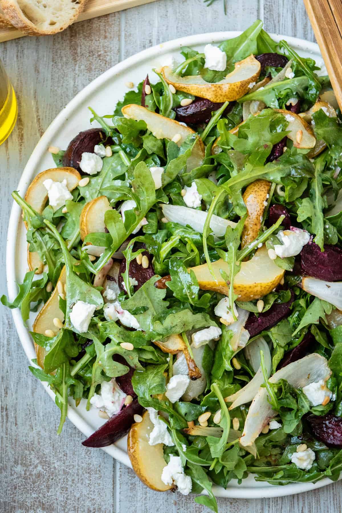 overhead photo of a serving platter of beet and goat cheese salad.