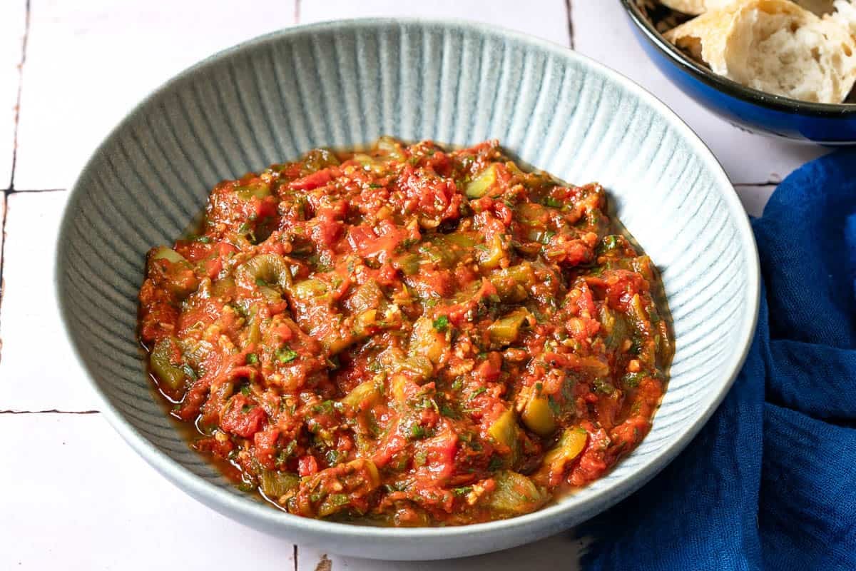 Side shot of taktouka in a bowl, showing the chunky texture.