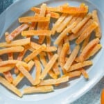 candied orange peels on a serving platter.