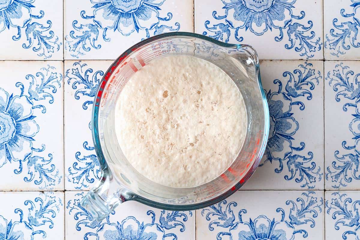 yeast being activated in a measuring cup.