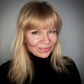 Headshot of writer Tara Holland.