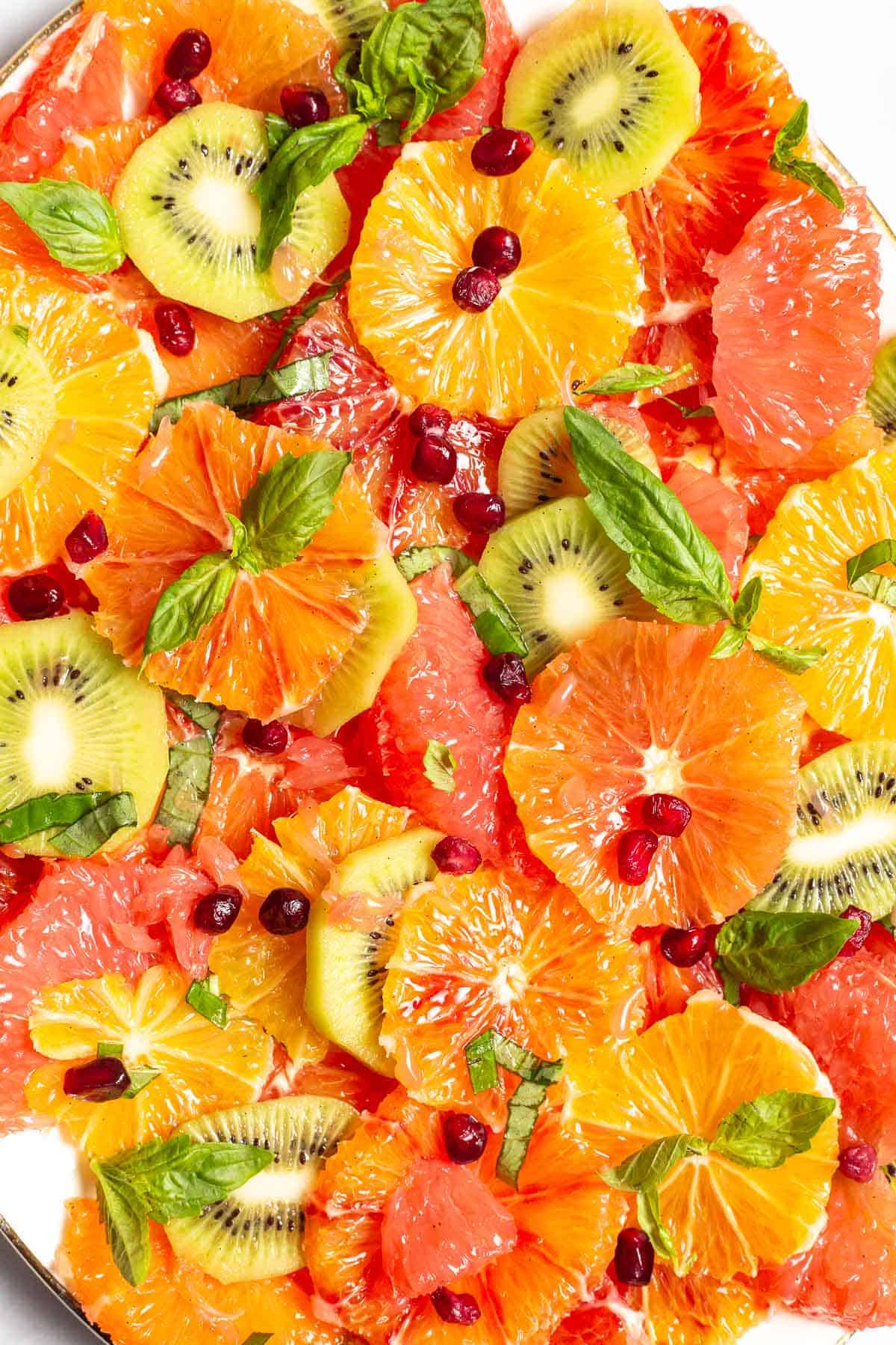 a close up photo of citrus salad on a serving platter.