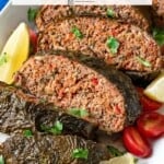 Pin image 1 for greek meatloaf with grape leaves.