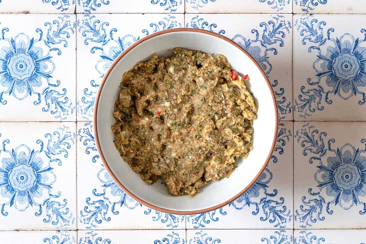 the mixture for moroccan fish kofta in a large bowl.