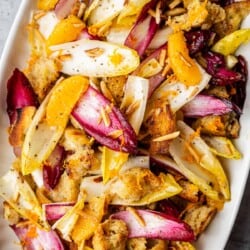 an overhead photo of endive salad in a serving bowl.