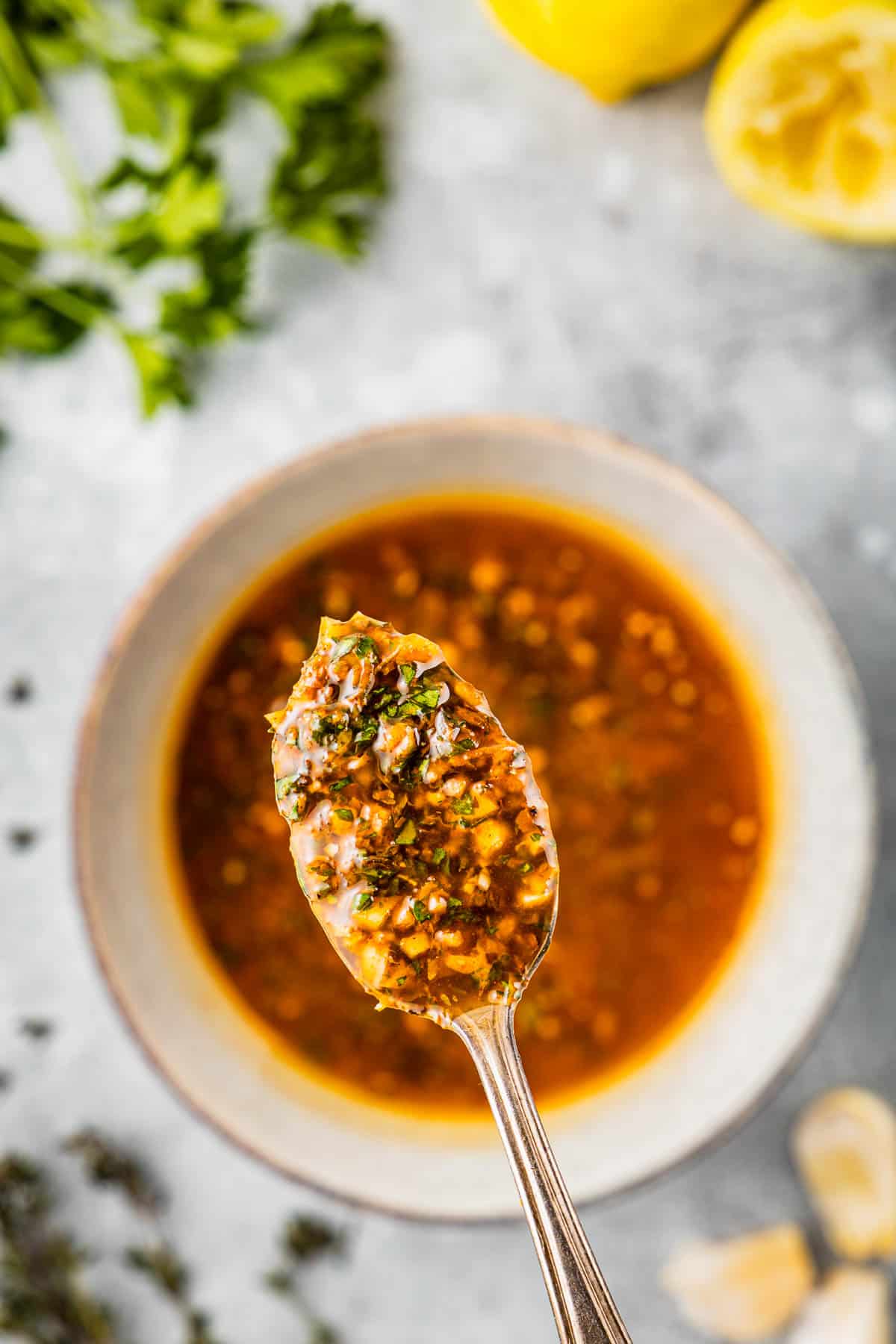 Spoonful of Greek chicken marinade.