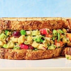 A close up of a vegan chickpea salad sandwich.