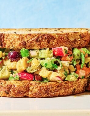 A close up of a vegan chickpea salad sandwich.