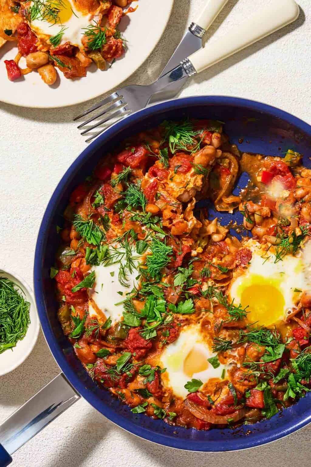 Shakshuka Recipe With Cannellini Beans The Mediterranean Dish TMD Jan White Bean Shakshuka Lead 05 Cropped 1024x1536