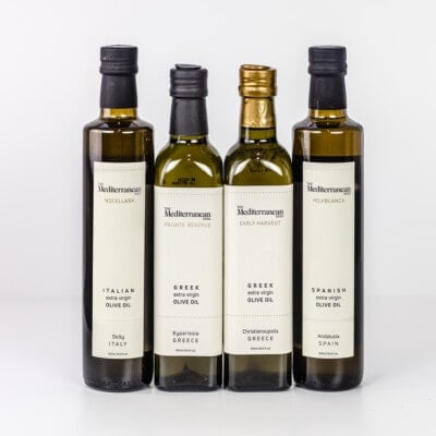 The 4 bottles of olive oil included in the signature bundle of olive oils from the Mediterranean Dish shop.