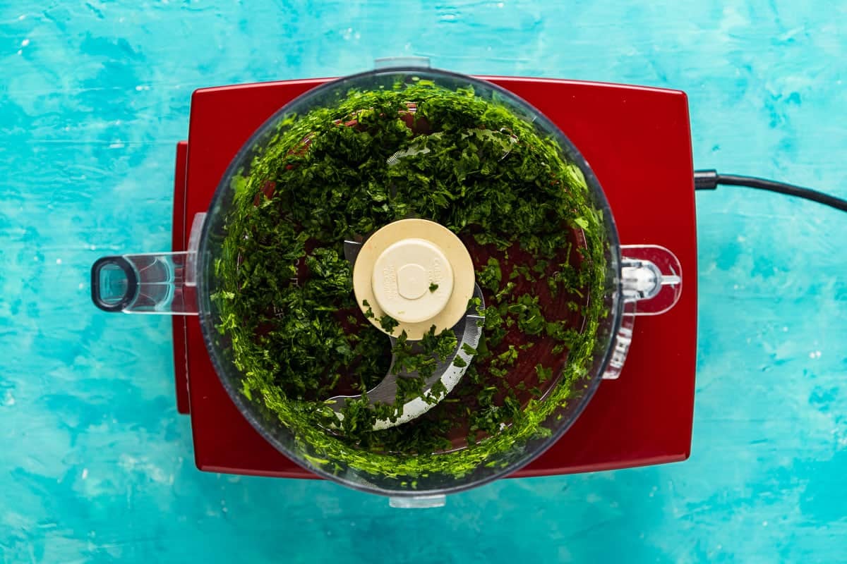 finely chopped parsley in the bowl of a food processor.