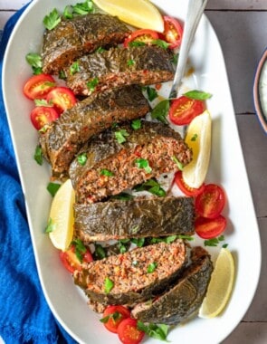 Greek meatloaf with grape leaves web story poster image.