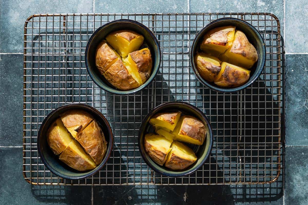 4 small potatoes cut cross-wise and broiled, each in it's own small bowl.