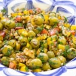 A close up of olive salad in a serving bowl.