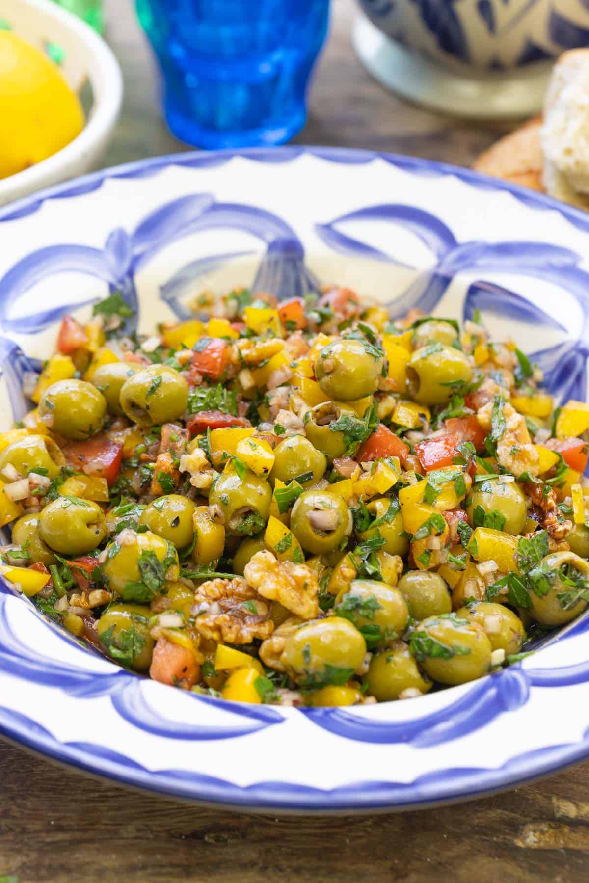 A close up of olive salad in a serving bowl.