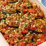 A close up of egyptian moussaka in a baking dish.