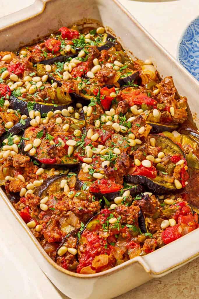 A close up of egyptian moussaka in a baking dish.