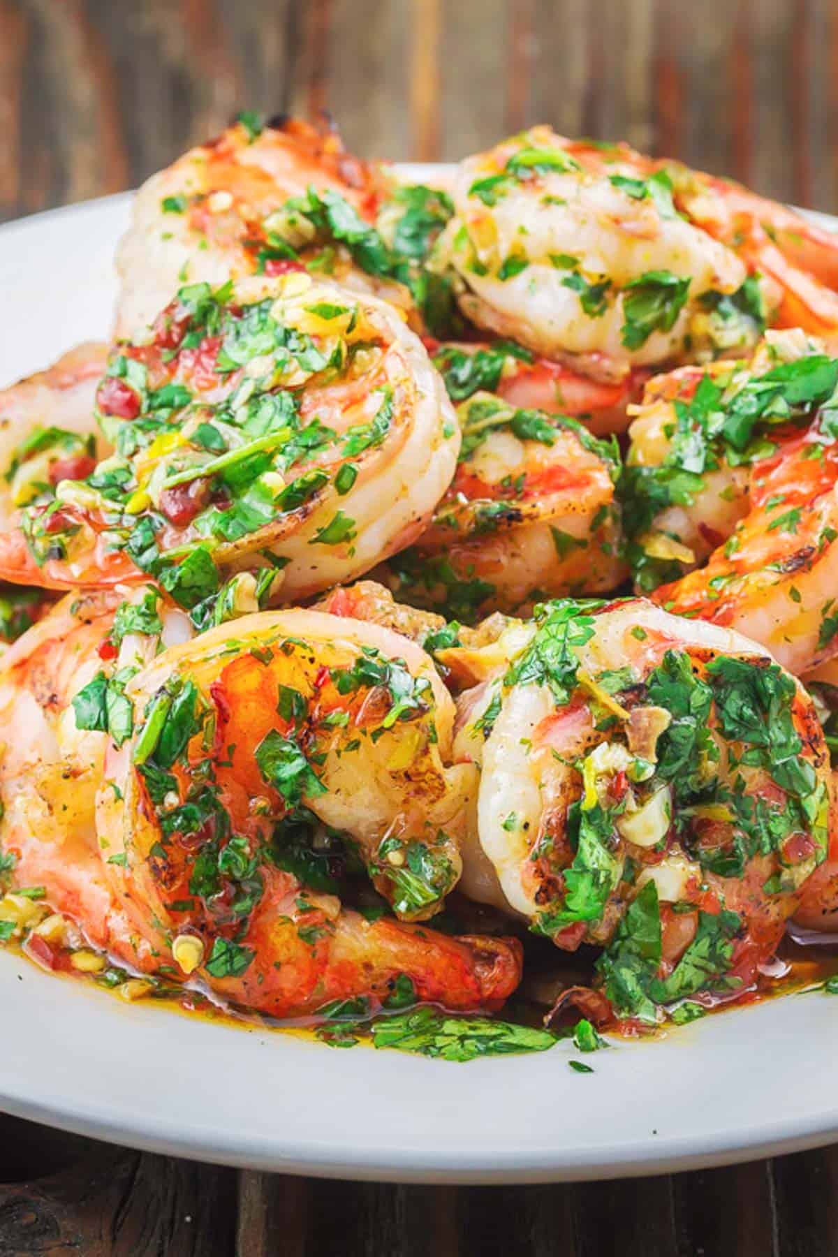 A close up of cilantro lime shrimp on a plate.