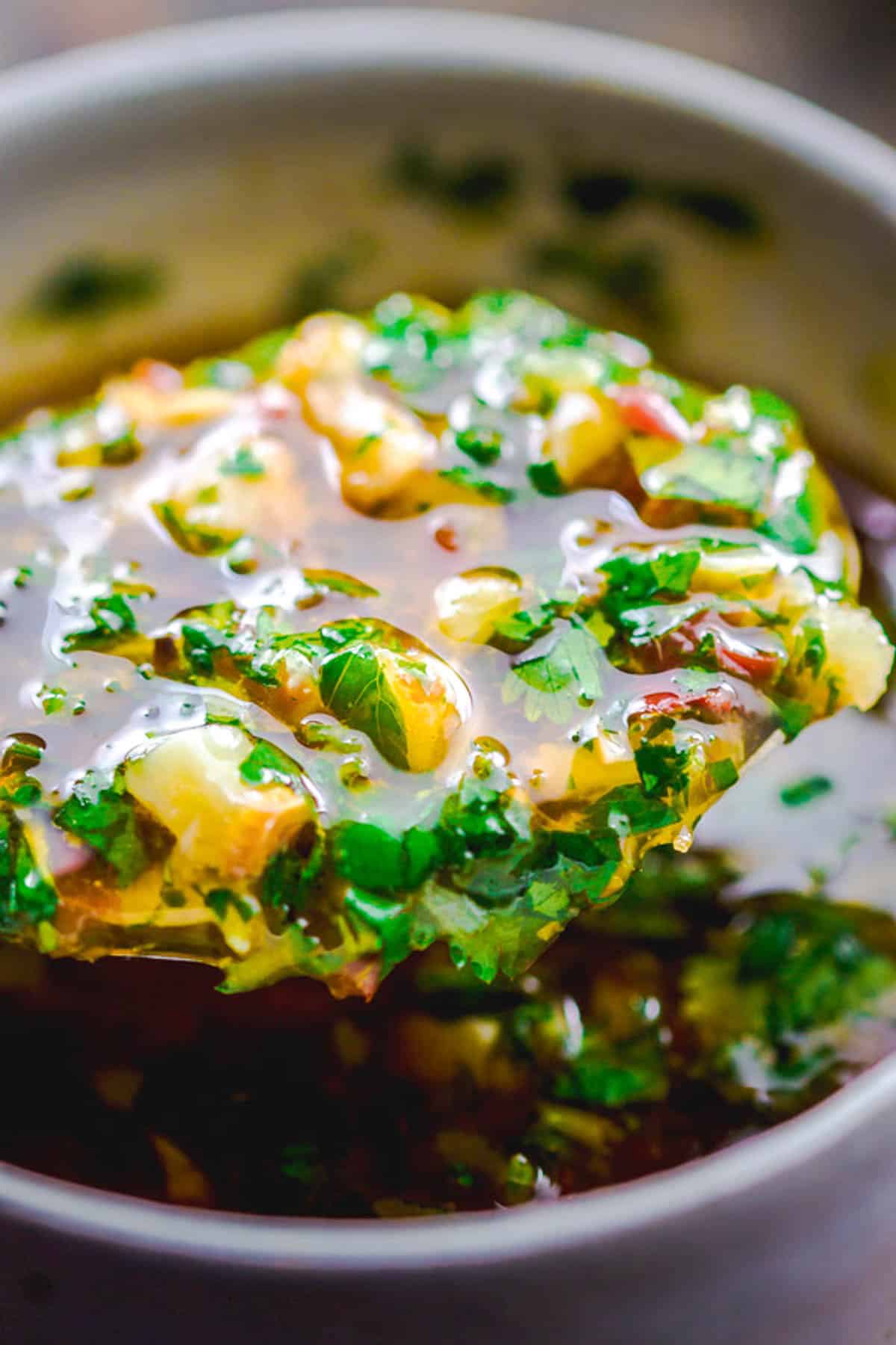 A close up of the sauce for the cilantro lime shrimp in a bowl.