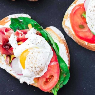 Image of an open faced sandwich with a poached egg.