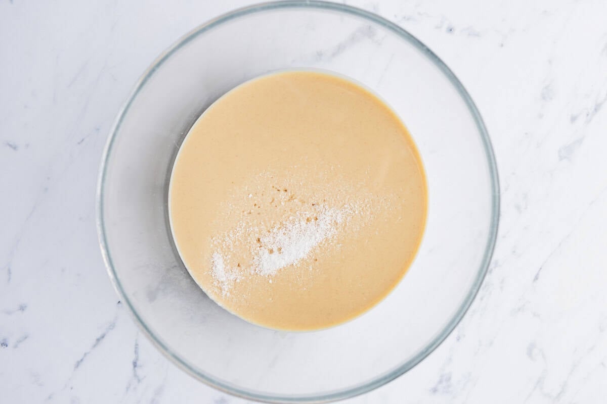Tahini, vanilla extract, and kosher salt in a bowl.