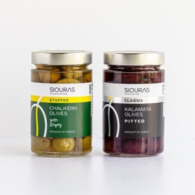 Jars of stuffed olives and kalamata olives from the mediterranean dish shop.