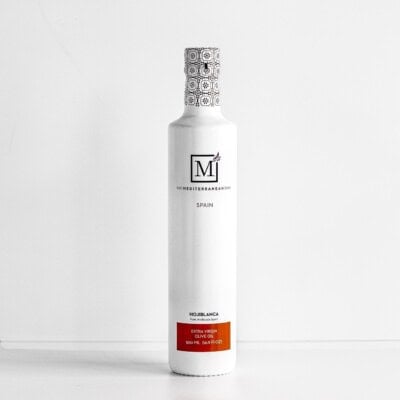 A bottle of hojiblanca extra virgin olive oil from the mediterranean dish.