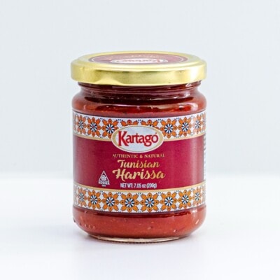 A jar of kartago tunisian harissa from the mediterranean dish shop.