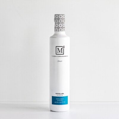 A bottle of nocellara extra virgin olive oil from the mediterranean dish.