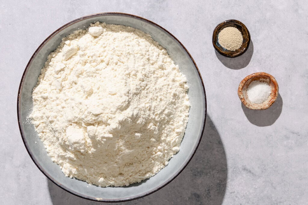 Ingredients for the french baguette recipe including all purpose flour, salt, and yeast.