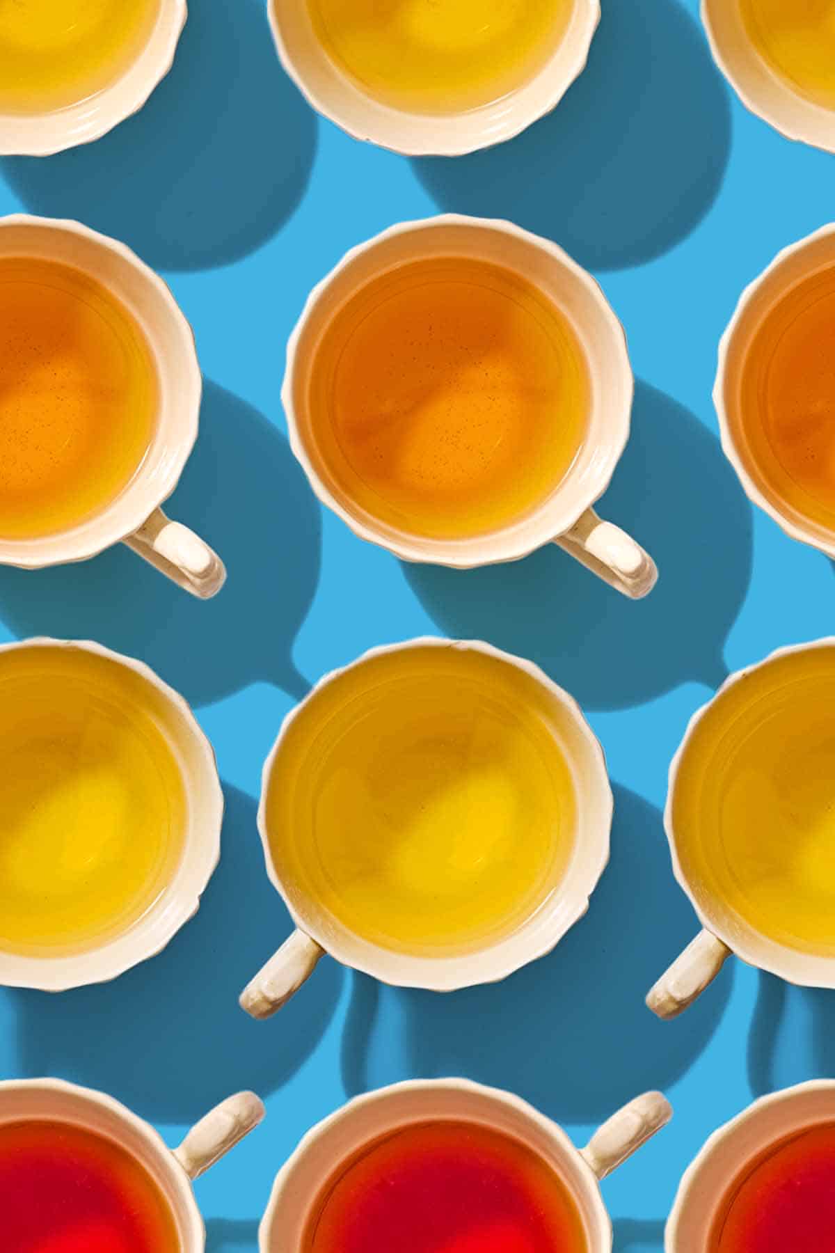 12 cups of teas of different flavors.