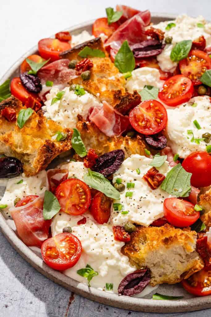 Burrata salad on a platter.