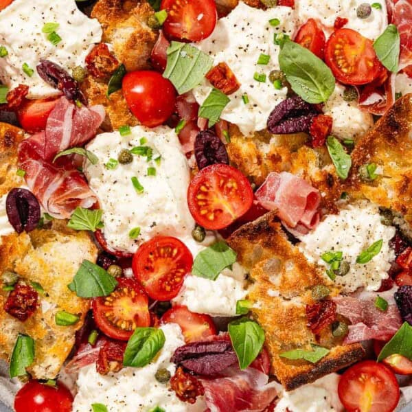 Burrata salad on a platter.