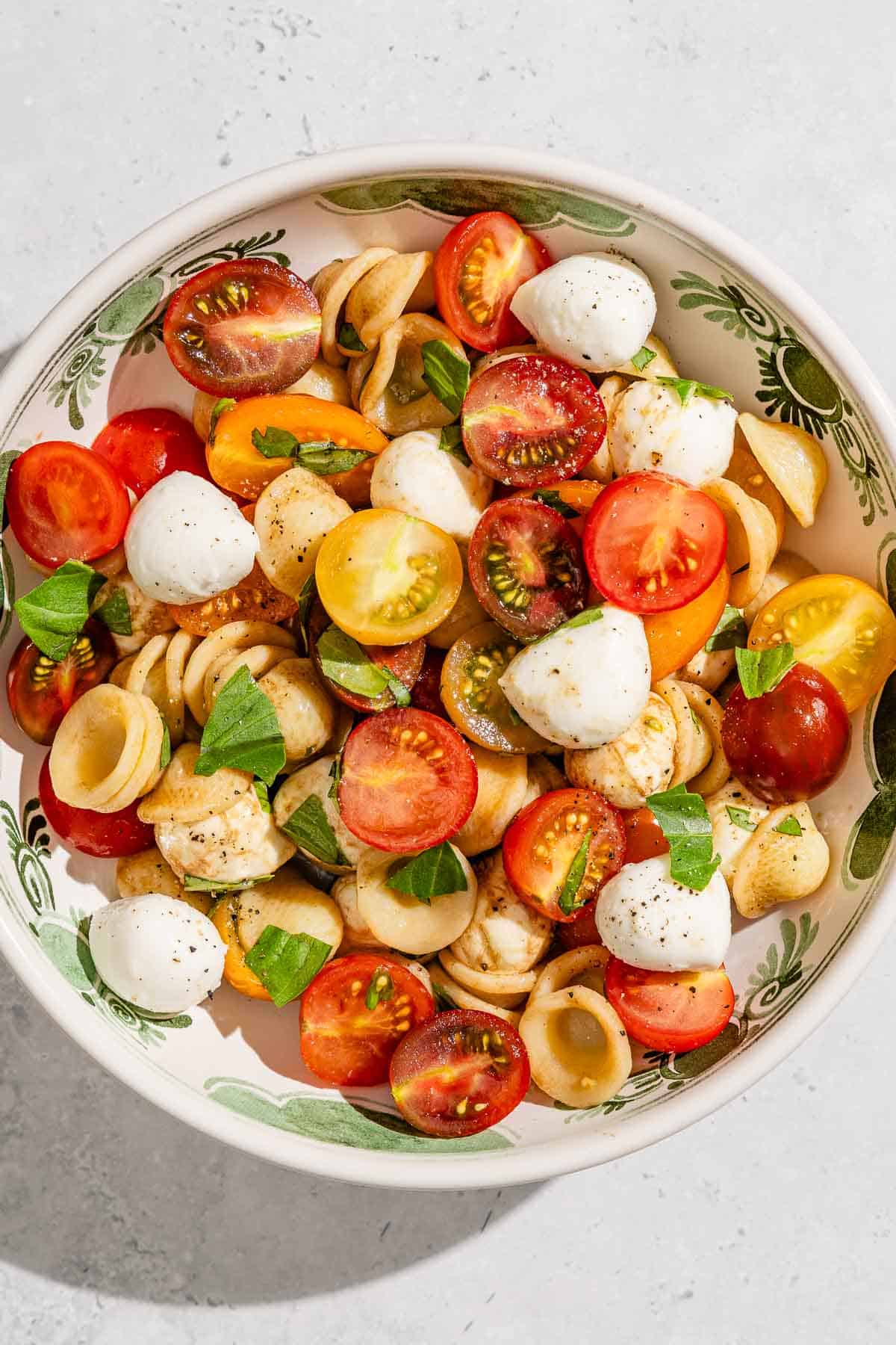 A portion of Caprese salad in a bowl.