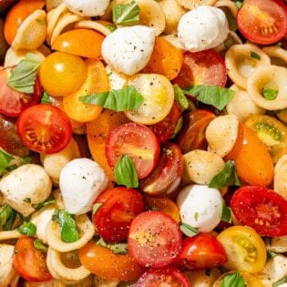 Caprese pasta salad in a serving bowl.