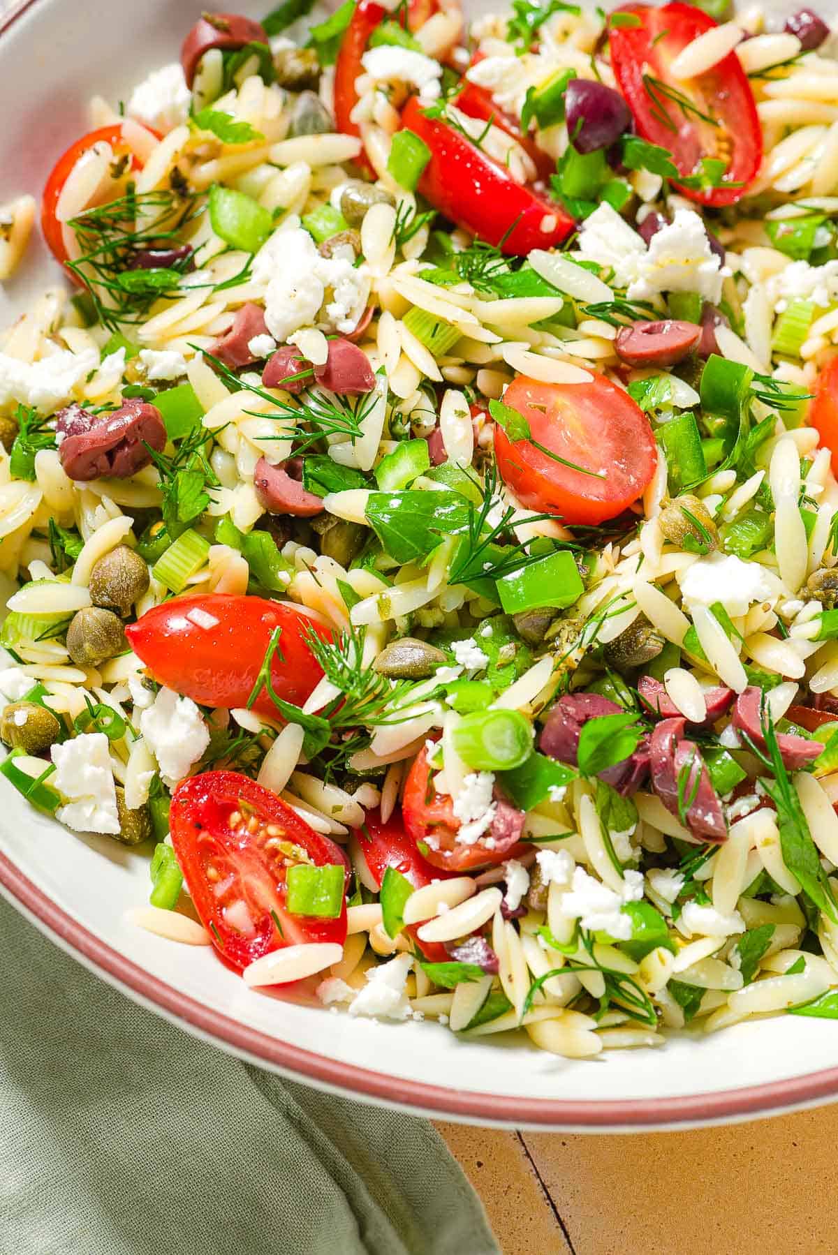 Orzo salad in a bowl.