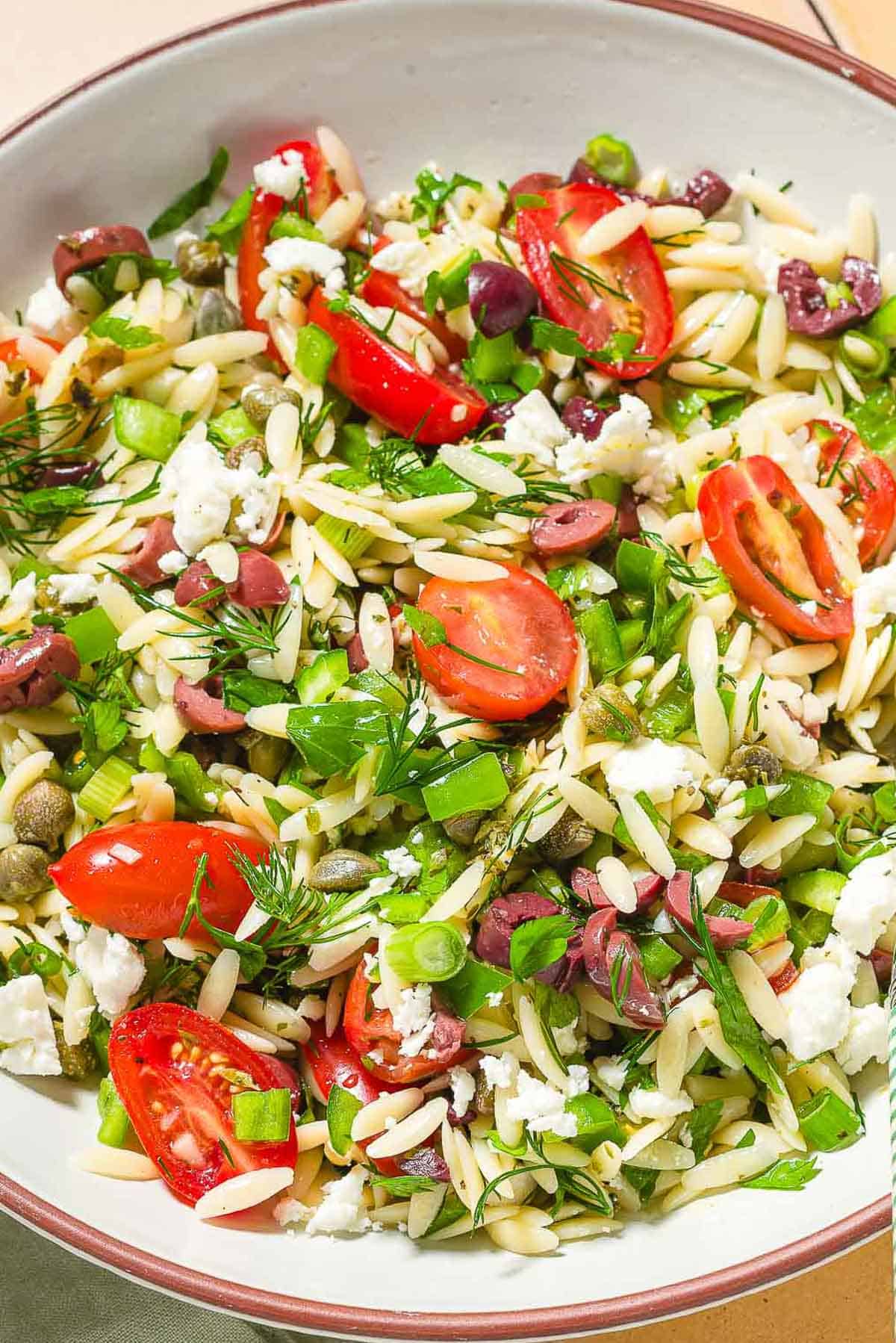 Orzo salad in a bowl.