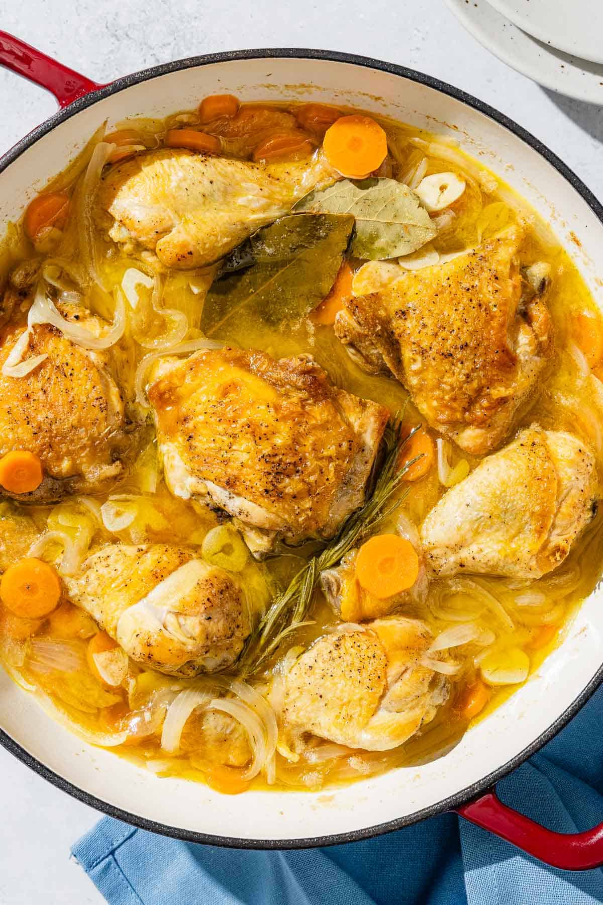 Escabeche de pollo in a skillet.