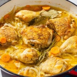 Escabeche de pollo in a skillet.