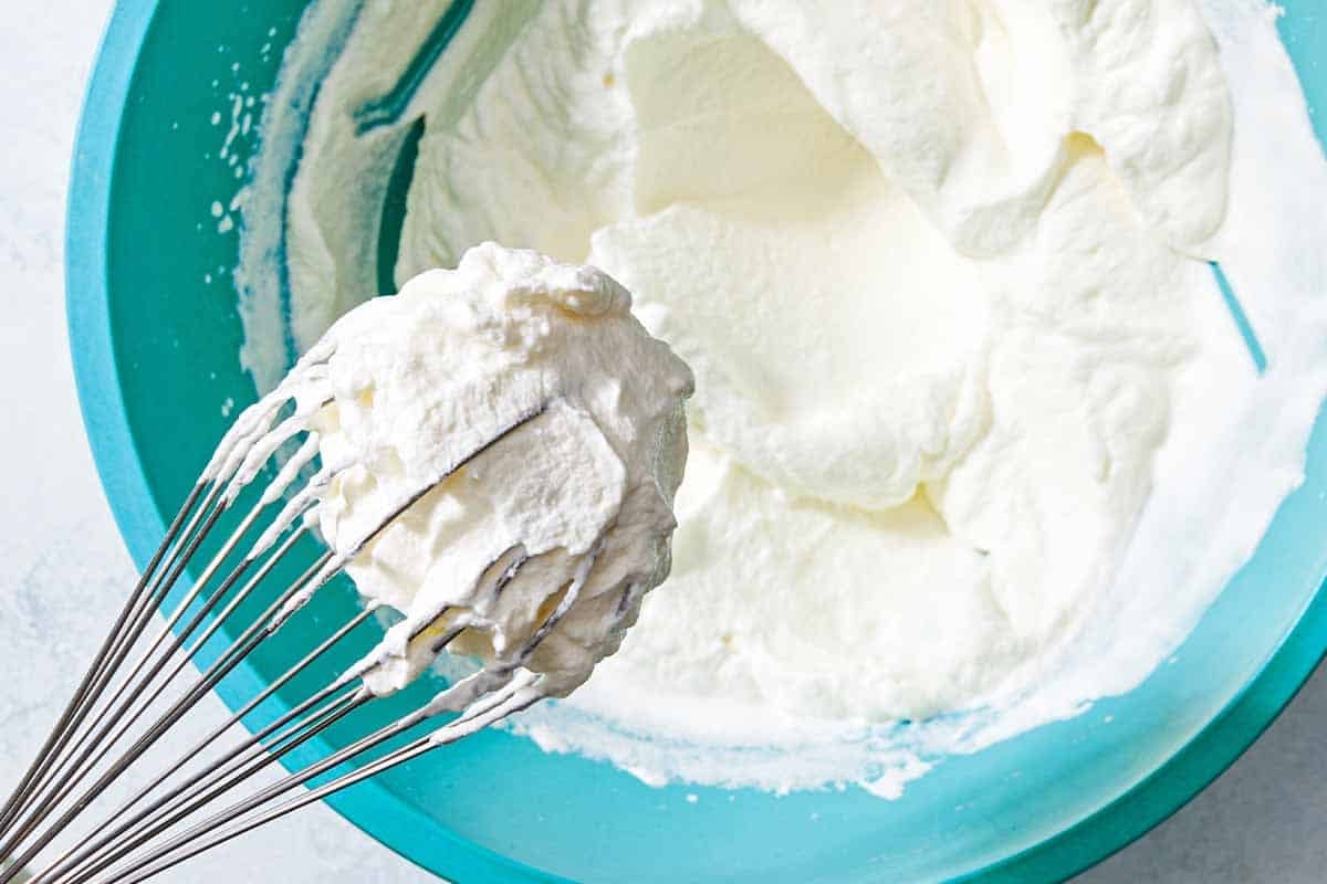 The cream for the persian ice cream beat into stiff peaks with a whisk.