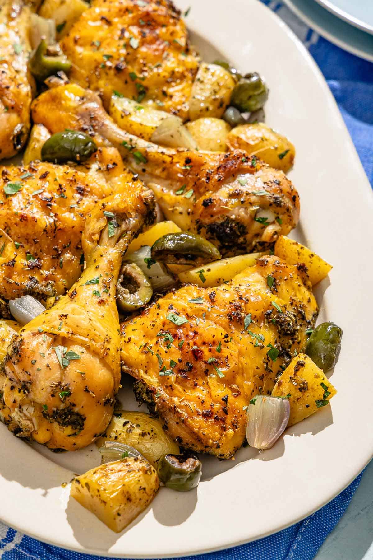 The chicken and potatoes recipe on a platter.